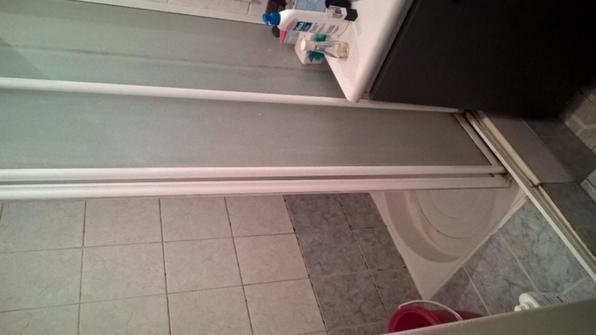 Remplacer douche par baignoire + casser mur pour installer verrire + remplacer meuble de salle de bain - 1